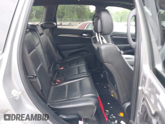 2019 Jeep Grand Cherokee High Altitude with VIN 1C4RJFCG1KC570199, listed as a IAAI auction lot 42464644 with 94,126 mi miles and . Bid and sale history available at DreamBid. Image 8.