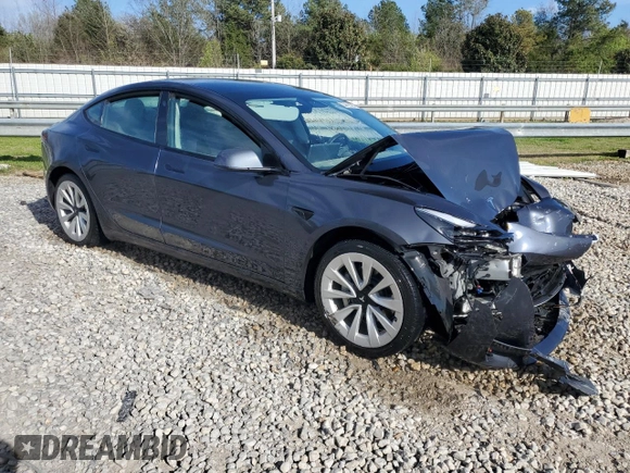 2022 Tesla Model 3 with VIN 5YJ3E1EA4NF371483, listed as a Copart auction lot 49287665 with 59,476 mi miles and Salvage Title. Bid and sale history available at DreamBid. Image 4.
