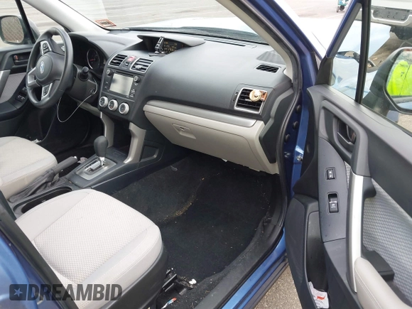 2018 Subaru Forester z VIN JF2SJABC7JH472767, wystawiony jako IAAI lot #40918955 z przebiegiem 72 592 mil mil oraz . Historia ofert i sprzedaży dostępna na DreamBid. Obrazek 5.