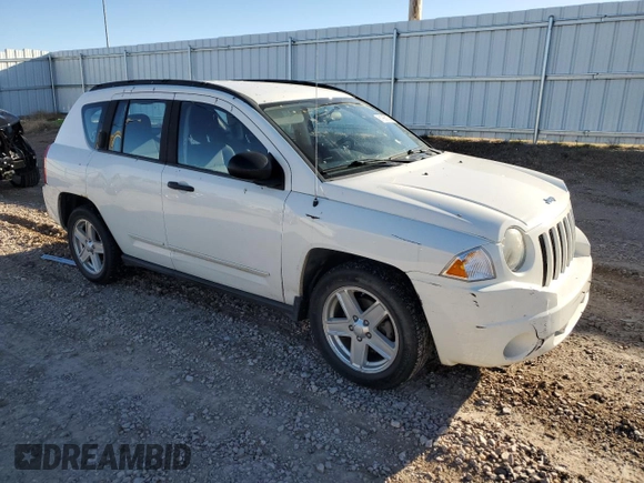 2010 Jeep Compass Sport with VIN 1J4NF4FB7AD503727, listed as a Copart auction lot 81966154 with 134,696 mi miles and Clean Title. Bid and sale history available at carsss.com. Image 4.
