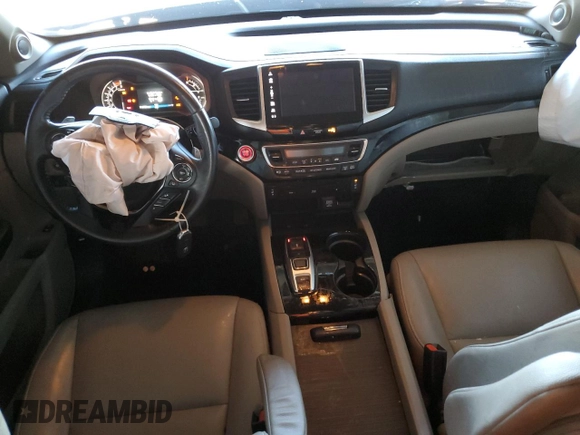2018 Honda Pilot Touring с VIN 5FNYF6H98JB053524, выставлен на аукционе Copart как лот 61447785 с пробегом 114 942 миль миль и Списание • Salvage title. История ставок и продаж доступна на DreamBid. Изображение 8.