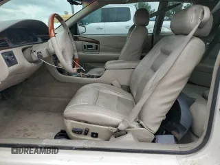2000 Cadillac Eldorado Touring with VIN 1G6ET1298YB702875, listed as a Copart auction lot 54434255 with 135,282 mi miles and Salvage Title. Bid and sale history available at DreamBid. Image 7.