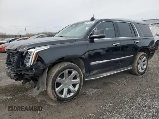 2018 Cadillac Escalade Luxury z VIN 1GYS4BKJ9JR267921, wystawiony jako Copart lot #49977725 z przebiegiem 98 012 mil mil oraz Szkoda całkowita • Salvage title. Historia ofert i sprzedaży dostępna na DreamBid. Obrazek 1.