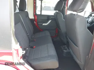 2012 Jeep Wrangler Unlimited Sahara with VIN 1C4BJWEG2CL209600, listed as a IAAI auction lot 42015290 with 133,229 mi miles and . Bid and sale history available at DreamBid. Image 8.