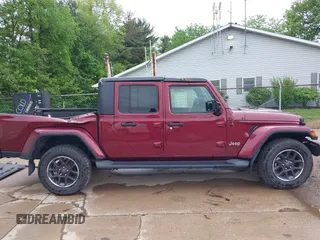 2021 Jeep Gladiator Overland z VIN 1C6HJTFGXML555622, wystawiony jako IAAI lot #42237686 z przebiegiem 62 358 mil mil oraz . Historia ofert i sprzedaży dostępna na DreamBid. Obrazek 13.