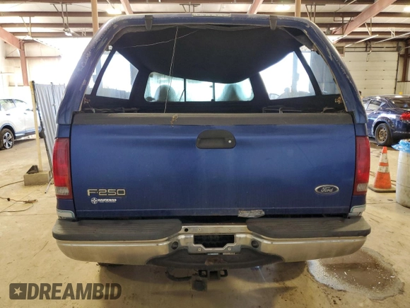 1999 Ford Super Duty F-250 XL with VIN 1FTNF21F2XEB09589, listed as a Copart auction lot 50700795 with 292,135 mi miles and Salvage Title. Bid and sale history available at carsss.com. Image 6.