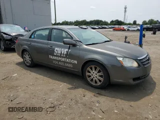 2005 Toyota Avalon XL z VIN 4T1BK36B85U014222, wystawiony jako Copart lot #59955415 z przebiegiem 239 897 mil mil oraz Czysty tytuł • Clean title. Historia ofert i sprzedaży dostępna na DreamBid. Obrazek 4.