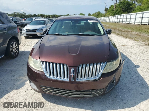 2009 Lincoln MKS with VIN 1LNHM93R19G631250, listed as a Copart auction lot 55442505 with 160,926 mi miles and Salvage Title. Bid and sale history available at DreamBid. Image 5.