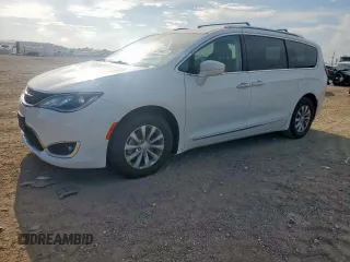2018 Chrysler Pacifica Touring L с VIN 2C4RC1BG1JR211259, выставлен на аукционе Copart как лот 62344015 с пробегом 95 741 миль миль и Чистый • Clean title. История ставок и продаж доступна на DreamBid. Изображение 1.