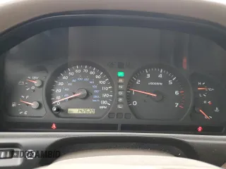 2000 Toyota Land Cruiser with VIN JT3HT05J7Y0084006, listed as a Copart auction lot 76390254 with 142,620 mi miles and Salvage Title. Bid and sale history available at carsss.com. Image 9.