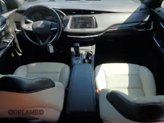 2021 Cadillac XT4 FWD Sport with VIN 1GYFZER44MF015908, listed as a Copart auction lot 52214925 with 94,079 mi miles and Clean Title. Bid and sale history available at carsss.com. Image 8.