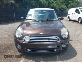 2010 MINI Hardtop with VIN WMWMF3C55ATZ23127, listed as a IAAI auction lot 42667783 with 61,954 mi miles and . Bid and sale history available at DreamBid. Image 6.