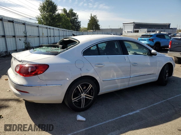 2012 Volkswagen CC Sport PZEV with VIN WVWMP7AN5CE521660, listed as a Copart auction lot 75190794 with 128,416 mi miles and Salvage Title. Bid and sale history available at carsss.com. Image 3.