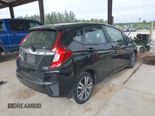 2015 Honda Fit EX-L z VIN 3HGGK5H81FM701122, wystawiony jako IAAI lot #42610165 z przebiegiem 74 969 mil mil oraz . Historia ofert i sprzedaży dostępna na DreamBid. Obrazek 4.