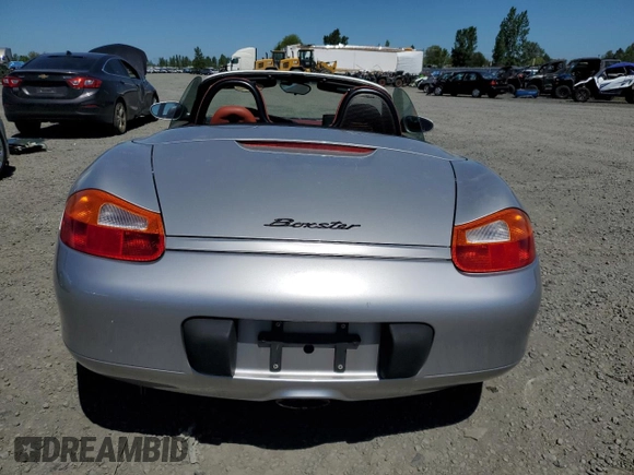 1998 Porsche Boxster z VIN WP0CA2986WU620657, wystawiony jako Copart lot #55595275 z przebiegiem 78 711 mil mil oraz Szkoda całkowita • Salvage title. Historia ofert i sprzedaży dostępna na DreamBid. Obrazek 6.
