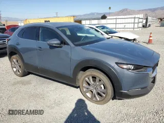 2020 Mazda CX-30 Premium with VIN 3MVDMAEM3LM107650, listed as a Copart auction lot 44573705 with 13,042 mi miles and Clean title. Bid and sale history available at DreamBid. Image 4.