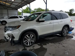 2017 Honda Pilot Elite with VIN 5FNYF6H0XHB096063, listed as a Copart auction lot 61651455 with 91,777 mi miles and Salvage title. Bid and sale history available at DreamBid. Image 1.