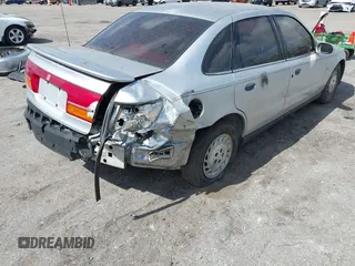 2002 Saturn LS z VIN 1G8JS54F92Y595651, wystawiony jako IAAI lot #41569902 z przebiegiem Nie podano mil oraz . Historia ofert i sprzedaży dostępna na DreamBid. Obrazek 12.