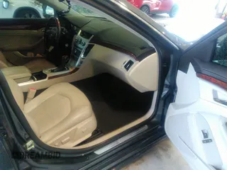 2013 Cadillac CTS Luxury with VIN 1G6DE5E54D0156491, listed as a IAAI auction lot 39844556 with 104,089 mi miles and . Bid and sale history available at DreamBid. Image 5.