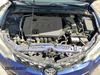 2014 Toyota Corolla L with VIN 5YFBURHE9EP040382, listed as a Copart auction lot 65289415 with 105,778 mi miles and Salvage title. Bid and sale history available at DreamBid. Image 11.