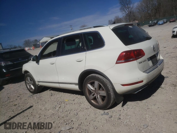 2012 Volkswagen Touareg Sport z VIN WVGFK9BP5CD000233, wystawiony jako Copart lot #46517515 z przebiegiem 198 242 mil mil oraz Szkoda całkowita • Salvage title. Historia ofert i sprzedaży dostępna na DreamBid. Obrazek 2.