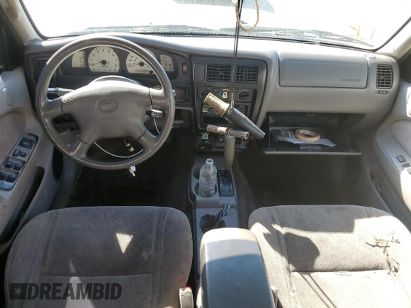 2003 Toyota Tacoma PreRunner z VIN 5TEGM92N43Z281269, wystawiony jako Copart lot #77200284 z przebiegiem 279 039 mil mil oraz Szkoda całkowita • Salvage title. Historia ofert i sprzedaży dostępna na DreamBid. Obrazek 8.