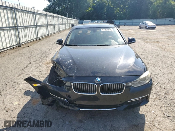 2012 BMW 3 Series 328i with VIN WBA3A5C58CF348710, listed as a Copart auction lot 61266815 with 112,720 mi miles and Salvage title. Bid and sale history available at DreamBid. Image 5.