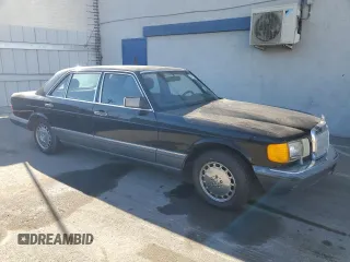 1991 Mercedes-Benz 560 with VIN WDBCA39E4MA583150, listed as a Copart auction lot 84738904 with 183,695 mi miles and Clean Title. Bid and sale history available at DreamBid. Image 4.