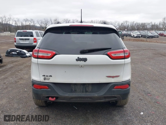 2016 Jeep Cherokee Trailhawk with VIN 1C4PJMBS7GW241076, listed as a IAAI auction lot 42020124 with 151,742 mi miles and . Bid and sale history available at DreamBid. Image 16.