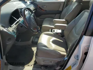 2002 Lexus RX 300 z VIN JTJGF10U920123463, wystawiony jako Copart lot #58590775 z przebiegiem 244 066 mil mil oraz Tytuł czysty. Historia ofert i sprzedaży dostępna na DreamBid. Obrazek 7.