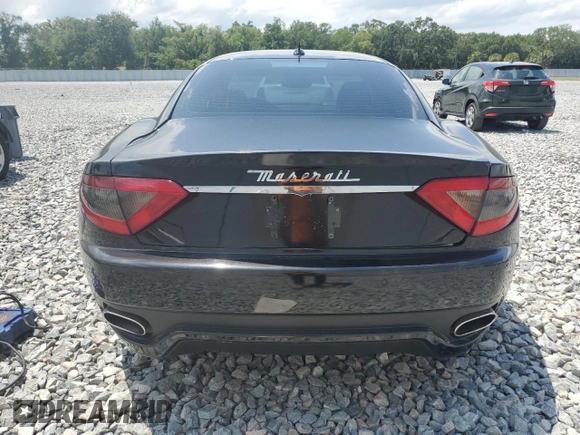 2011 Maserati GranTurismo S with VIN ZAM45KLA9B0059436, listed as a Copart auction lot 55851475 with Not provided miles and Clean title. Bid and sale history available at DreamBid. Image 6.