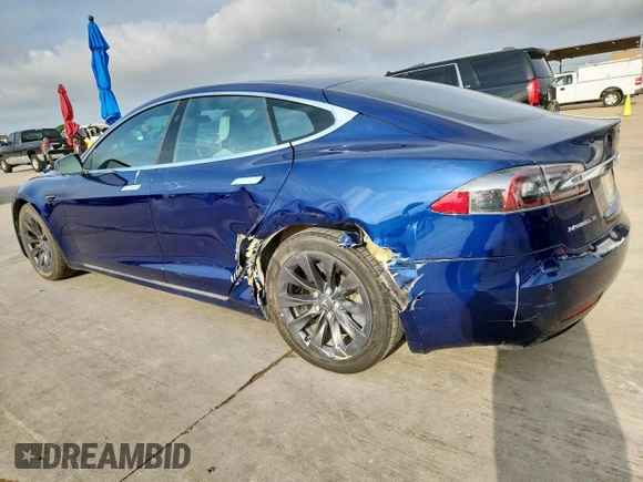 2018 Tesla Model S 75D с VIN 5YJSA1E26JF275221, выставлен на аукционе Copart как лот 61101885 с пробегом 122 530 миль миль и Списание • Salvage title. История ставок и продаж доступна на DreamBid. Изображение 2.