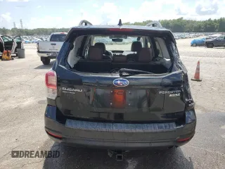 2017 Subaru Forester Touring z VIN JF2SJAWCXHH431232, wystawiony jako Copart lot #61625265 z przebiegiem 67 280 mil mil oraz Szkoda całkowita • Salvage title. Historia ofert i sprzedaży dostępna na DreamBid. Obrazek 6.
