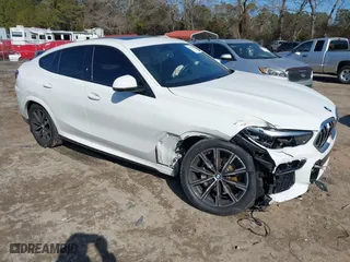 2023 BMW X6 xDrive40i with VIN 5UXCY6C00P9N46581, listed as a IAAI auction lot 41417378 with 35,085 mi miles. Bid and sale history available at carsss.com. Image 1.