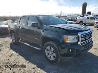 2015 GMC Canyon 2WD SLE with VIN 1GTG5BEA9F1139608, listed as a Copart auction lot 88911415 with 135,942 mi miles and Salvage Title. Bid and sale history available at carsss.com. Image 4.