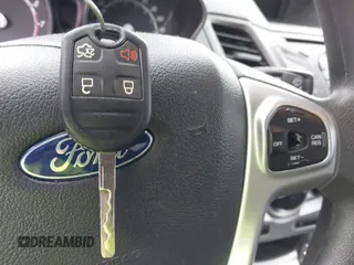 2018 Ford Fiesta SE with VIN 3FADP4BJXJM136232, listed as a IAAI auction lot 41901540 with 119,065 mi miles and . Bid and sale history available at DreamBid. Image 11.