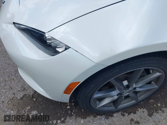 2020 Mazda MX-5 Miata Grand Touring z VIN JM1NDAM79L0411456, wystawiony jako IAAI lot #42229479 z przebiegiem 63 508 mil mil oraz . Historia ofert i sprzedaży dostępna na DreamBid. Obrazek 6.