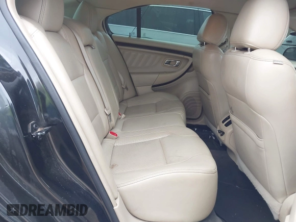 2013 Ford Taurus Limited with VIN 1FAHP2F84DG106350, listed as a IAAI auction lot 41833203 with 195,548 mi miles. Bid and sale history available at carsss.com. Image 8.