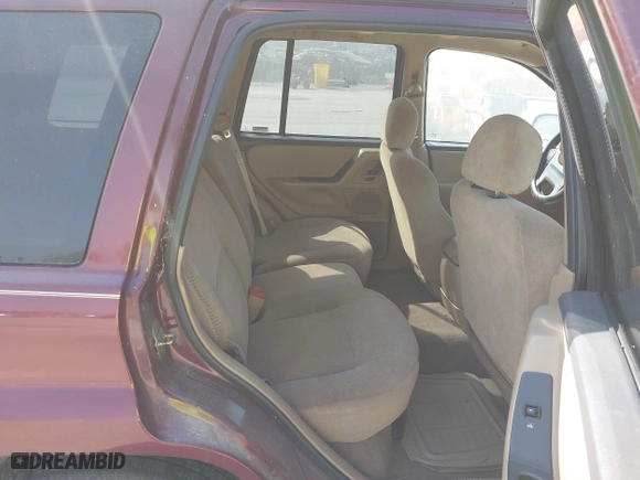 1999 Jeep Grand Cherokee Laredo with VIN 1J4GW58S6XC554582, listed as a IAAI auction lot 41780284 with 183,156 mi miles. Bid and sale history available at carsss.com. Image 8.
