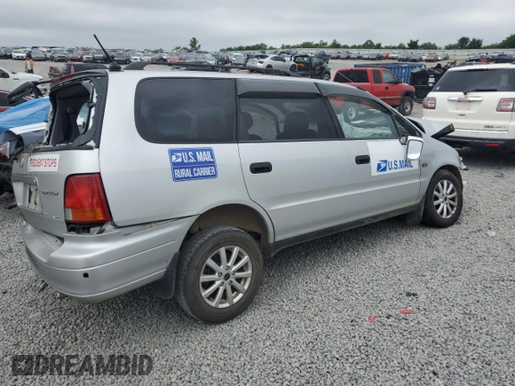 1997 Honda Odyssey z VIN RA21211409, wystawiony jako Copart lot #62449015 z przebiegiem Nie podano mil oraz Szkoda całkowita • Salvage title. Historia ofert i sprzedaży dostępna na DreamBid. Obrazek 3.