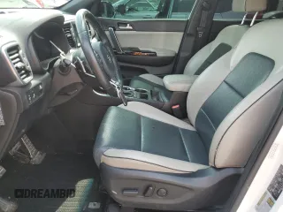2019 Kia Sportage EX z VIN KNDPNCAC7K7522953, wystawiony jako Copart lot #54906835 z przebiegiem 128 011 mil mil oraz Szkoda całkowita • Salvage title. Historia ofert i sprzedaży dostępna na DreamBid. Obrazek 7.