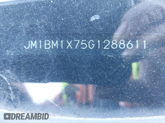 2016 Mazda Mazda3 i Grand Touring with VIN JM1BM1X75G1288611, listed as a IAAI auction lot 42001357 with 107,830 mi miles. Bid and sale history available at carsss.com. Image 17.