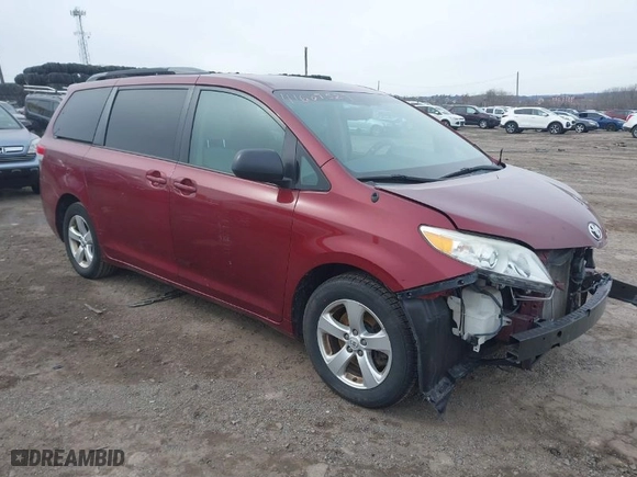 2014 Toyota Sienna LE AAS with VIN 5TDKK3DC6ES433383, listed as a IAAI auction lot 41607527 with 115,235 mi miles. Bid and sale history available at carsss.com. Image 1.