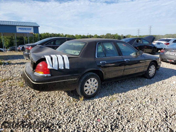 2002 Ford Crown Victoria Police z VIN 2FAFP71W52X157857, wystawiony jako Copart lot #65963304 z przebiegiem 203 427 mil mil oraz Tytuł czysty. Historia ofert i sprzedaży dostępna na DreamBid. Obrazek 3.