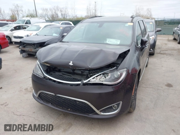 2017 Chrysler Pacifica Touring L with VIN 2C4RC1BG1HR797200, listed as a IAAI auction lot 42044020 with 124,115 mi miles and . Bid and sale history available at DreamBid. Image 6.