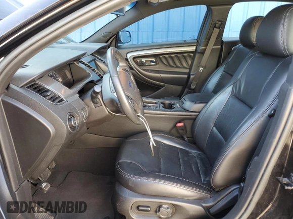2019 Ford Taurus SEL with VIN 1FAHP2E83KG100019, listed as a Copart auction lot 58158304 with 67,083 mi miles and Salvage Title. Bid and sale history available at DreamBid. Image 7.