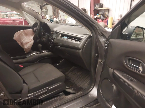 2018 Honda HR-V LX with VIN 3CZRU6H35JM704037, listed as a IAAI auction lot 41574796 with 140,671 mi miles. Bid and sale history available at carsss.com. Image 5.