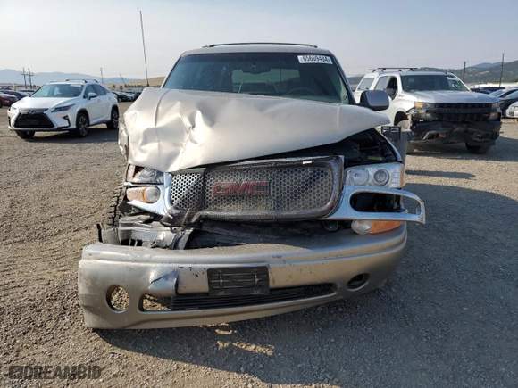 2001 GMC Yukon Denali with VIN 1GKEK63U01J192800, listed as a Copart auction lot 65669434 with 117,089 mi miles and Clean Title. Bid and sale history available at carsss.com. Image 5.