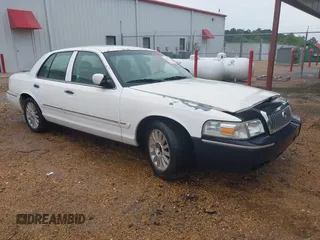 2008 Mercury Grand Marquis LS z VIN 2MEFM75V28X653615, wystawiony jako IAAI lot #42192340 z przebiegiem 105 572 mil mil oraz . Historia ofert i sprzedaży dostępna na DreamBid. Obrazek 1.