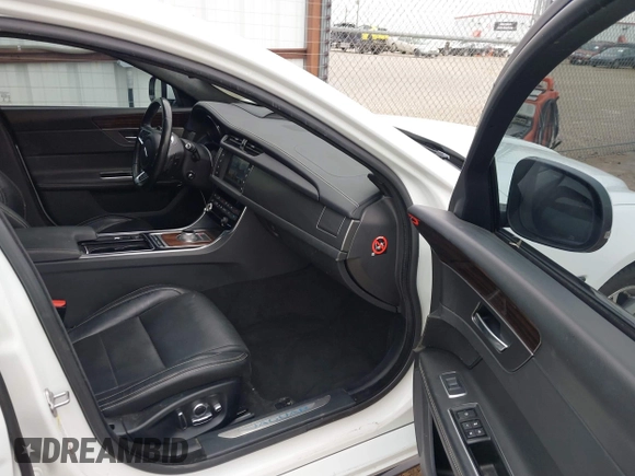2016 Jaguar XF S with VIN SAJBG4BV6GCY06777, listed as a IAAI auction lot 41439170 with 63,313 mi miles. Bid and sale history available at carsss.com. Image 5.